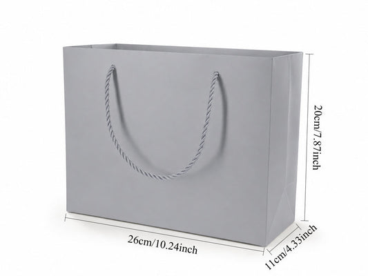 Front view of silver jewelry store gift tote bag with rope handles, 10.25 × 4.25 × 7.75 in