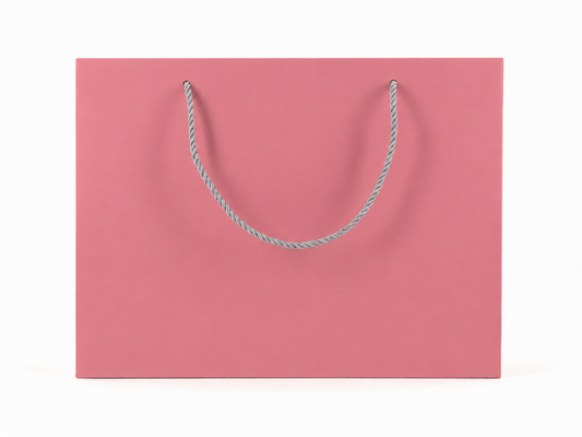 Front view of pink jewelry store gift tote bag with rope handles, 13 × 6 × 9.75 in