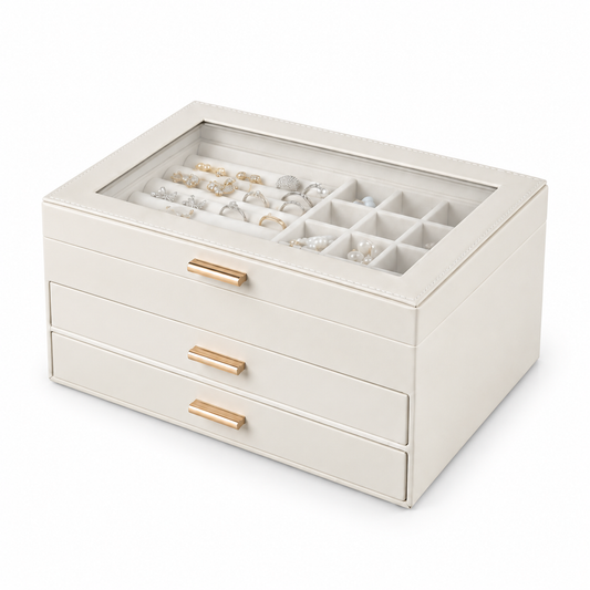 White PU jewelry box with drawers, clear closed lid and gold-tone handles