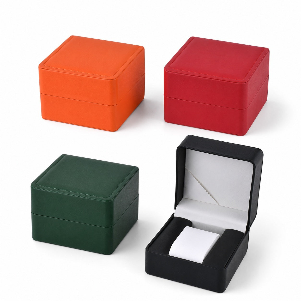 Multicolor watch boxes arranged in two parallel rows with orange, red, green, and open black styles for retail display and gift packaging.