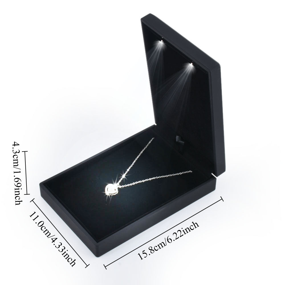Black LED light small necklace box shown open with 15.8 by 11.0 by 4.3 cm dimensions