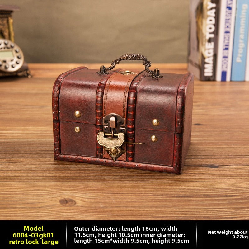 Large reddish brown wooden chest with scalloped vintage padlock