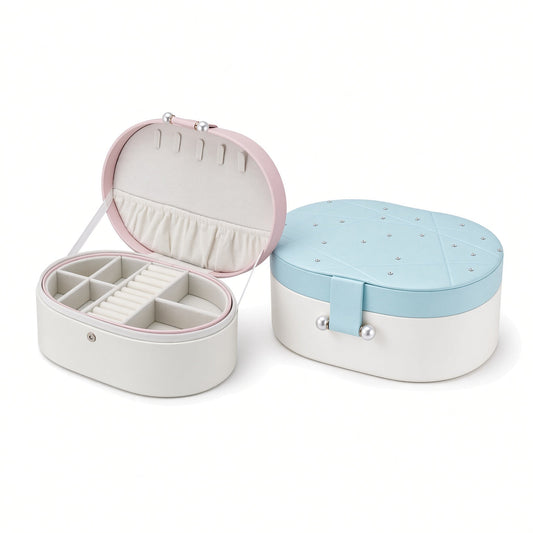Oval jewelry box shown open in pink and white beside a closed blue and white box