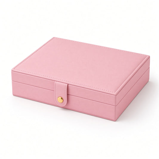 Closed pink PU jewelry case with stitched lid and gold-tone snap fastener
