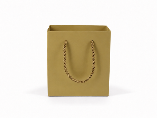 Front view of gold jewelry store gift tote bag with rope handles, 4.75 × 2.75 × 5 in
