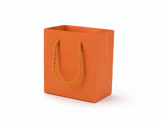 Front view of orange jewelry store gift tote bag with rope handles, 4.75 × 2.75 × 5 in