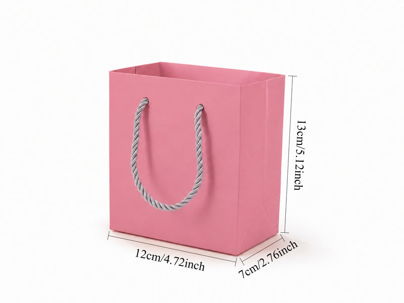 Bulk 24-pack of pink paper gift bags for jewelry retail packaging, 4.75 × 2.75 × 5 in