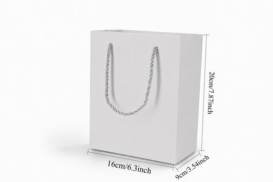 Front view of white jewelry store gift tote bag with rope handles, 6.25 × 3.5 × 7.75 in