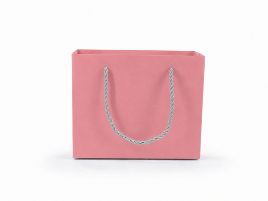 Front view of pink jewelry store gift tote bag with rope handles, 7.75 × 3.5 × 6.25 in