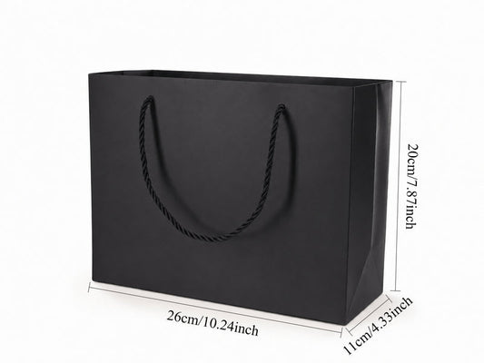 Front view of black jewelry store gift tote bag with rope handles, 10.25 × 4.25 × 7.75 in