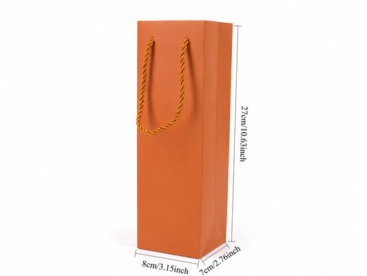 Front view of orange jewelry store gift tote bag with rope handles, 3.25 × 2.75 × 10.75 in